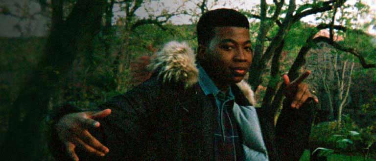 Raising Kanan, man with coat outdoors